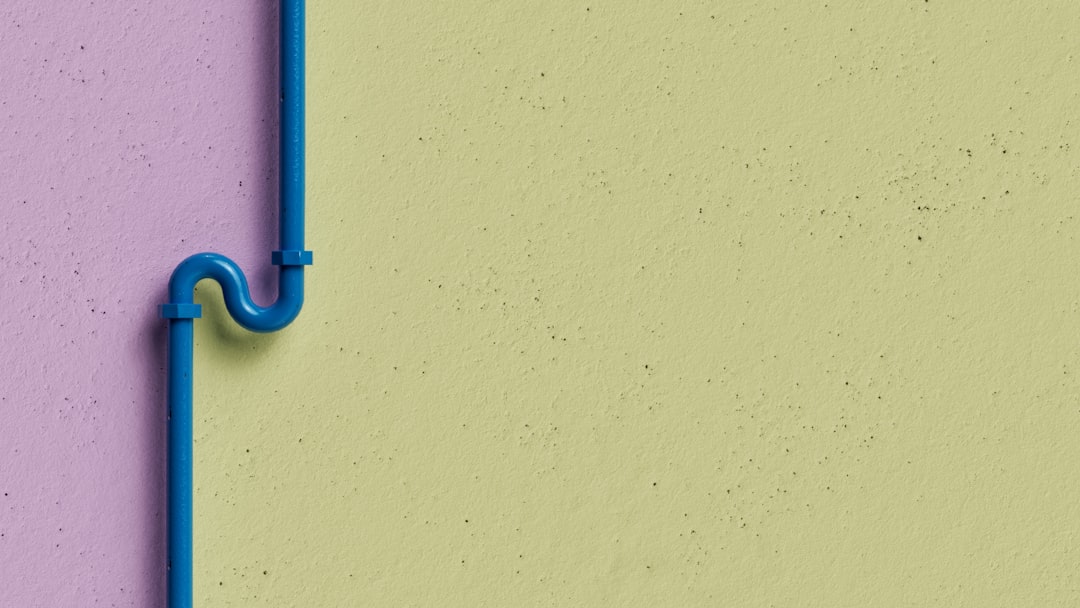 A close-up of a complex tangle of colorful electronic wires on a clean, minimal background, representing the digital 'noise' and confusion parents face when seeking online advice.